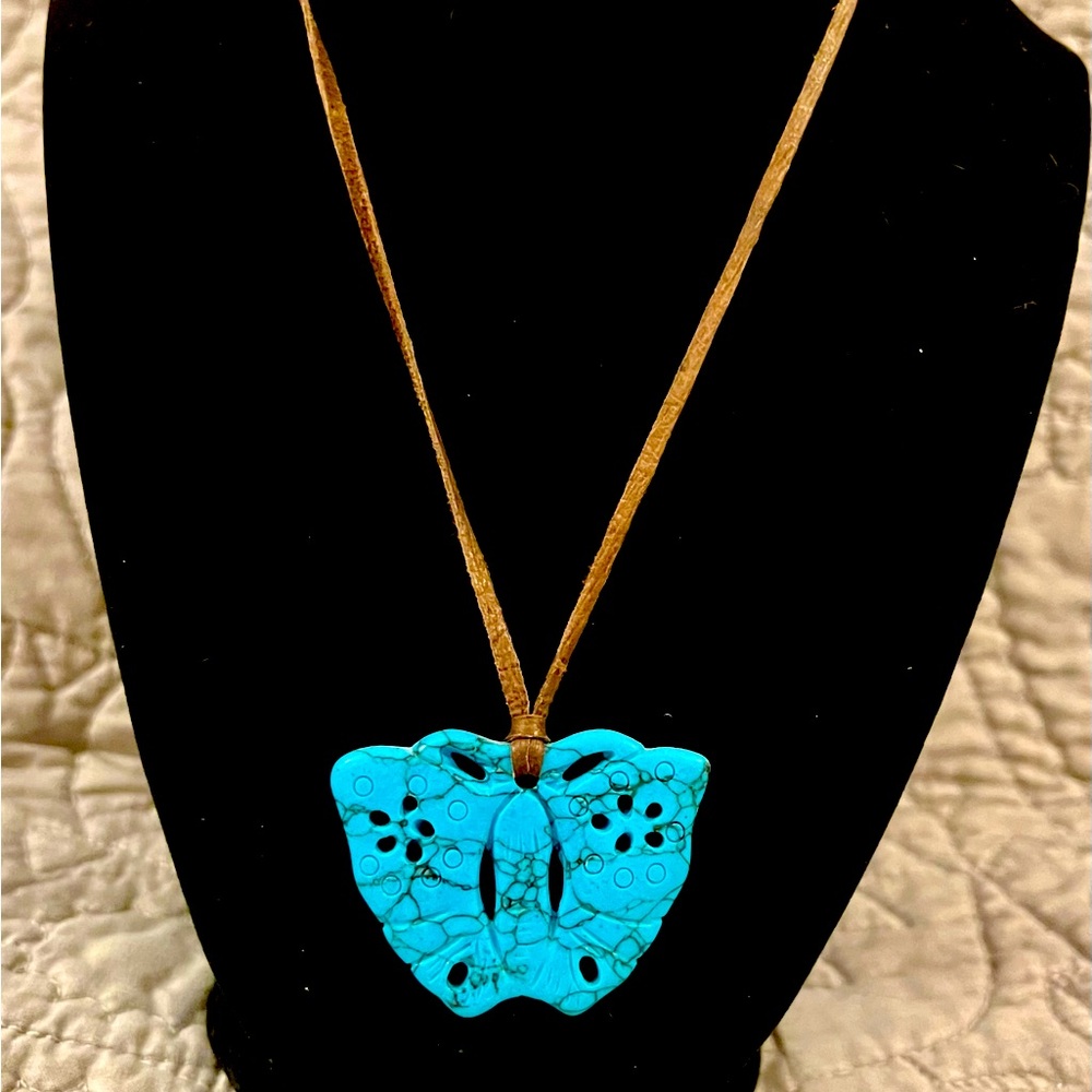 Turquoise butterfly necklace.